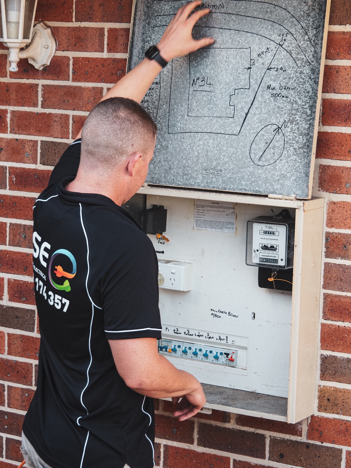 A Newcastle electrician wiring a dedicated circuit for a home EV charger